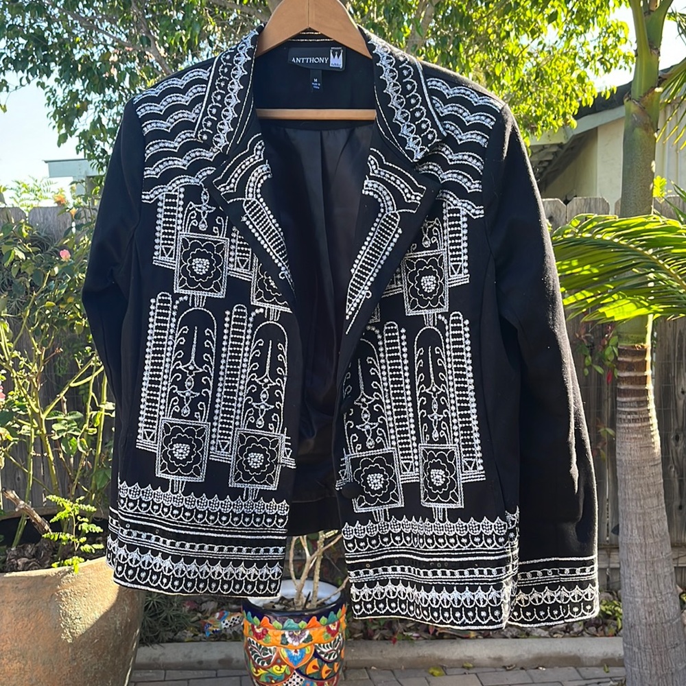 Super cute jacket. Too small for me.